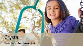  Presentation with swing - PPT theme with children playground activities residential - boy and girl playing background and a soft green colored foreground