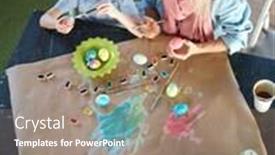  Presentation with grandma - Amazing PPT theme having boy and his grandma painting traditional easter eggs backdrop and a coral colored foreground