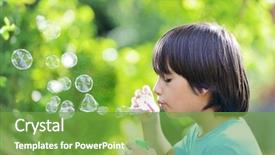  Presentation with making soap - Audience pleasing PPT theme consisting of boy making soap bubbles free backdrop and a seafoam green colored foreground