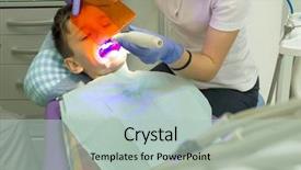  Presentation with orthodontics orthodontic model and dentist - Amazing PPT layouts having boy mouth orthodontist put braces backdrop and a mint green colored foreground