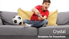  Presentation with video game - Beautiful presentation theme featuring boy playing football video game backdrop and a dark gray colored foreground