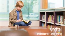  Presentation with school building - Colorful slides enhanced with boy reading book in school backdrop and a coral colored foreground