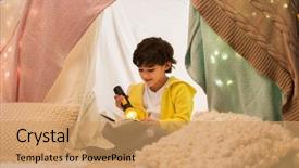  Presentation with kids reading book - PPT theme having boy reading book with torch background and a coral colored foreground