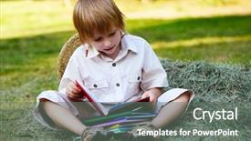  Presentation with children books - PPT theme consisting of boy reading books sitting background and a gray colored foreground