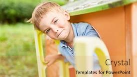  Presentation with playground - Slide set having boy-smiles-mischievously-and-looks background and a yellow colored foreground