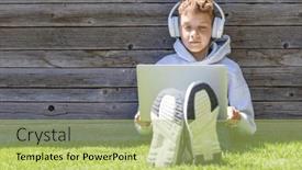  Presentation with entertainment - Slide set having boy-using-a-laptop background and a yellow colored foreground