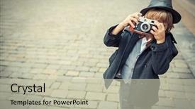  Presentation with old camera and film sound - PPT theme with boy with an old camera background and a  colored foreground