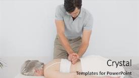  Presentation with physiotherapist - Slide set having braq manipulator - male physiotherapist massaging a senior background and a soft green colored foreground