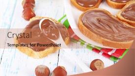  Presentation with spread - Audience pleasing slide set consisting of bread with sweet chocolate hazelnut spread on plate on table backdrop and a coral colored foreground