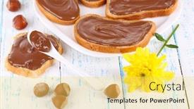  Presentation with spread - Amazing presentation theme having bread with sweet chocolate hazelnut spread on plate on table backdrop and a yellow colored foreground