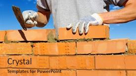  Presentation with concrete construction - PPT theme having bricklayer laying bricks to make background and a gold colored foreground