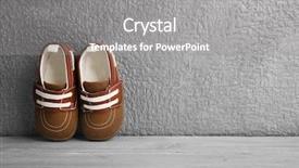  Presentation with baby shoes - PPT layouts consisting of brown baby shoes on grey background and a gray colored foreground