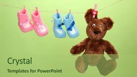  Presentation with baby color - PPT layouts enhanced with brown bear family - baby booties hanging on clothesline background and a mint green colored foreground