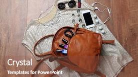  Presentation with brown leather - PPT theme enhanced with leather backpack with female item background and a tawny brown colored foreground