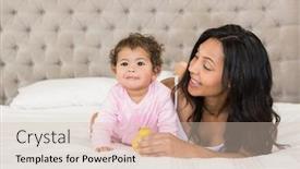  Presentation with duck - Beautiful PPT theme featuring brunette playing with her baby and a duck on the bed backdrop and a soft green colored foreground