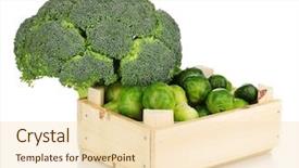  Presentation with brussels - Audience pleasing presentation consisting of brussels sprouts in wooden crate and broccoli isolated on white backdrop and a lemonade colored foreground