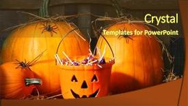  Presentation with halloween candy - Presentation theme enhanced with bucket filled with halloween candy and pumpkins background and a tawny brown colored foreground