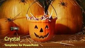  Presentation with halloween candy - Colorful presentation theme enhanced with bucket filled with halloween candy and pumpkins backdrop and a tawny brown colored foreground