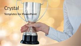  Presentation with gold trophy - Audience pleasing PPT theme consisting of business hand with trophy backdrop and a blonde colored foreground