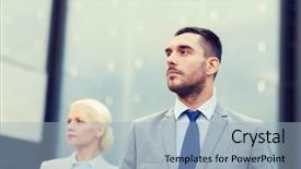  Presentation with partnership - Theme having business partnership success and people concept - close up of serious businessman and businesswoman standing over office building background and a light blue colored foreground