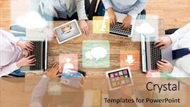  Presentation with computers - PPT layouts enhanced with business people media and technology concept - close up of creative team with laptop and tablet pc computers sitting at table in office background and a coral colored foreground