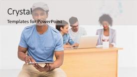  Presentation with using digital tablet - Presentation enhanced with casual male artist using digital tablet with colleagues in the background at a bright office background and a light gray colored foreground