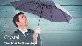  Presentation with under umbrella - Audience pleasing presentation design consisting of businessman sheltering under black umbrella against painted blue wooden planks backdrop and a gray colored foreground