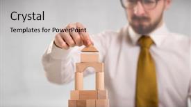  Presentation with wooden building blocks - Audience pleasing slide deck consisting of businessman using wooden building blocks backdrop and a soft green colored foreground