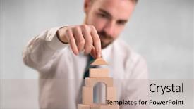  Presentation with wooden building blocks - Amazing presentation theme having businessman using wooden building blocks backdrop and a coral colored foreground