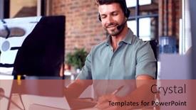  Presentation with support - Presentation theme featuring businessman-wearing-headset-at-computer background and a red colored foreground