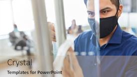  Presentation with face mask - PPT theme featuring businessman-with-face-mask-disinfects background and a mint green colored foreground