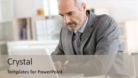  Presentation with computer - PPT theme enhanced with businessman working on laptop computer background and a light gray colored foreground