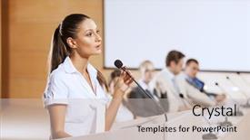  Presentation with audience - Amazing presentation having businesswoman standing on stage and reporting for audience backdrop and a soft green colored foreground