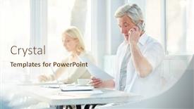  Presentation with busy work - Theme having busy mature man with grey hair reading terms of contract to client by the phone during work background and a cream colored foreground