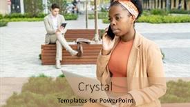  Presentation with gadget - PPT theme consisting of busy-young-african-female-agent background and a coral colored foreground