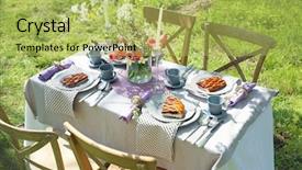  Presentation with elegant table setting - PPT layouts having cage with flowers in garden background and a yellow colored foreground