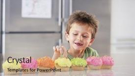  Presentation with cupcakes - PPT theme consisting of cake decoration - happy young boy tasting cupcakes background and a  colored foreground