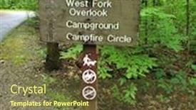  Presentation with campfire - Colorful slides enhanced with campground-park-sign-in-forest backdrop and a tawny brown colored foreground