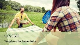  Presentation with campsite - Amazing theme having camping travel tourism hike and people concept - happy couple laying picnic blanket at campsite backdrop and a soft green colored foreground