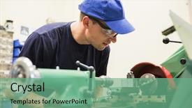  Presentation with machinery - Presentation theme having engineering student using heavy machinery background and a seafoam green colored foreground