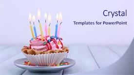  Presentation with cup cake - Presentation theme with candles on saucer and sparkle background and a sky blue colored foreground