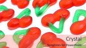  Presentation with gummy candy - Amazing PPT theme having candy store - gummy cherries backdrop and a red colored foreground