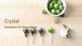  Presentation with lollipop - Amazing PPT theme having candy wrappers on table april backdrop and a lemonade colored foreground