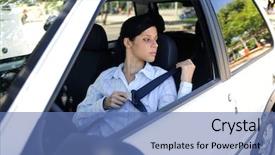  Presentation with safety driving - Amazing presentation theme having car safety female driver fastening backdrop and a teal colored foreground