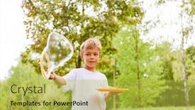  Presentation with making soap - Theme featuring carefree-boy-making-soap-bubble background and a yellow colored foreground