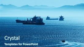  Presentation with cargo ship - Audience pleasing PPT theme consisting of cargo ship with mountain silhouette in sea backdrop and a ocean colored foreground