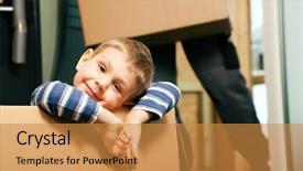  Presentation with new home - PPT layouts consisting of family moving in their new home the son is sitting inside a moving box in the background the father - or a mover only legs to be seen is carrying boxes inside the building background and a gold colored foreground
