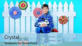 Presentation with child boy hold basket - Cool new PPT theme with cartoon rabbit - happy child boy with easter backdrop and a light blue colored foreground
