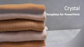  Presentation with knitted knitting needle - PPT theme consisting of cashmere - stack of knitted sweaters-gray background background and a gray colored foreground