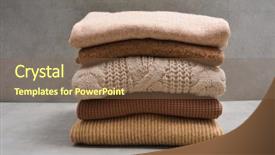  Presentation with knitted knitting needle - PPT theme featuring cashmere - stack of knitted sweaters-gray background background and a tawny brown colored foreground